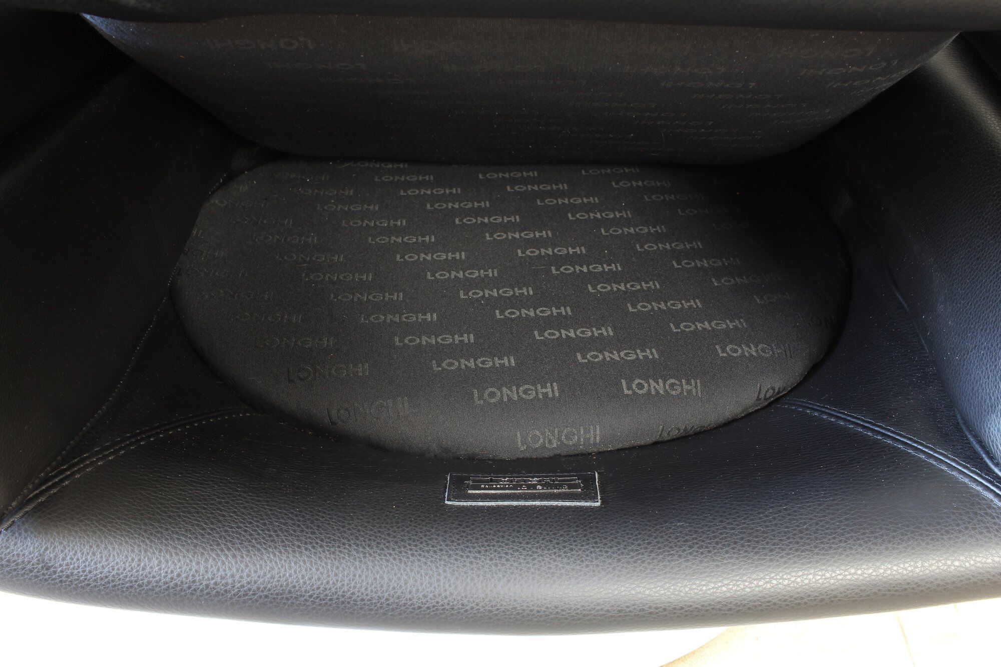 Joe Colombo Elda Chair + Ottoman in Black Leather and White Fiberglass Shell