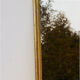 Miroir en bois doré avec moulure perlée - 70x46cm