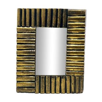 Art deco mirror in gilded wood