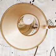 Gilded bronze hot water bottle lamp, Empire style, beige metal lampshade