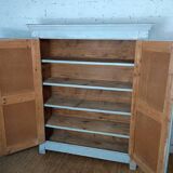 Low Parisian wardrobe with two doors, made of fir with original patina