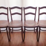 4 bistro chairs in curved wood and art nouveau patterns