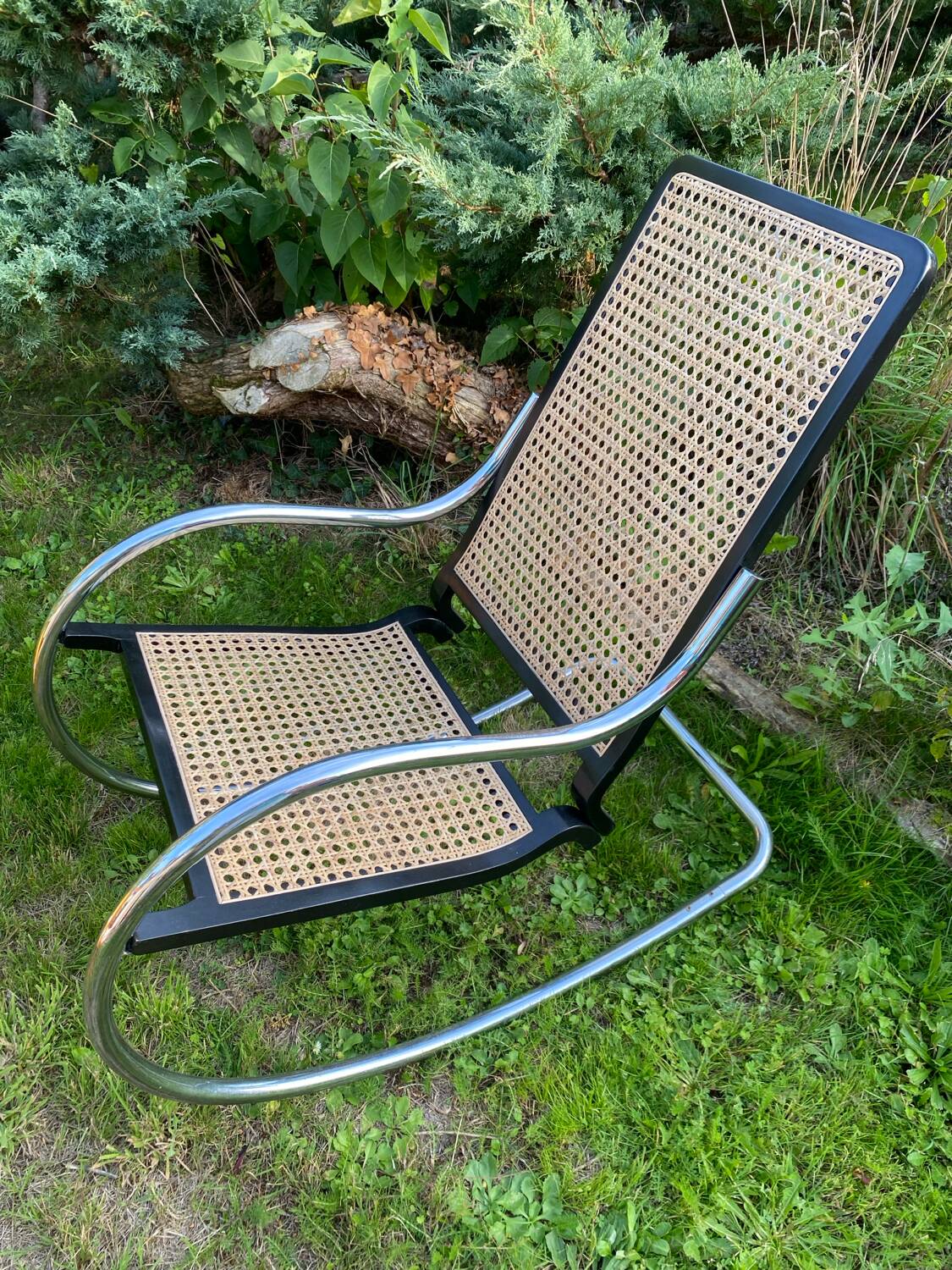 Chrome and cane rocking chair