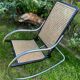 Chrome and cane rocking chair
