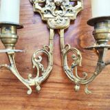Pair of gilded bronze sconces decorated with Louis XIV style mascarons