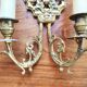 Pair of gilded bronze sconces decorated with Louis XIV style mascarons