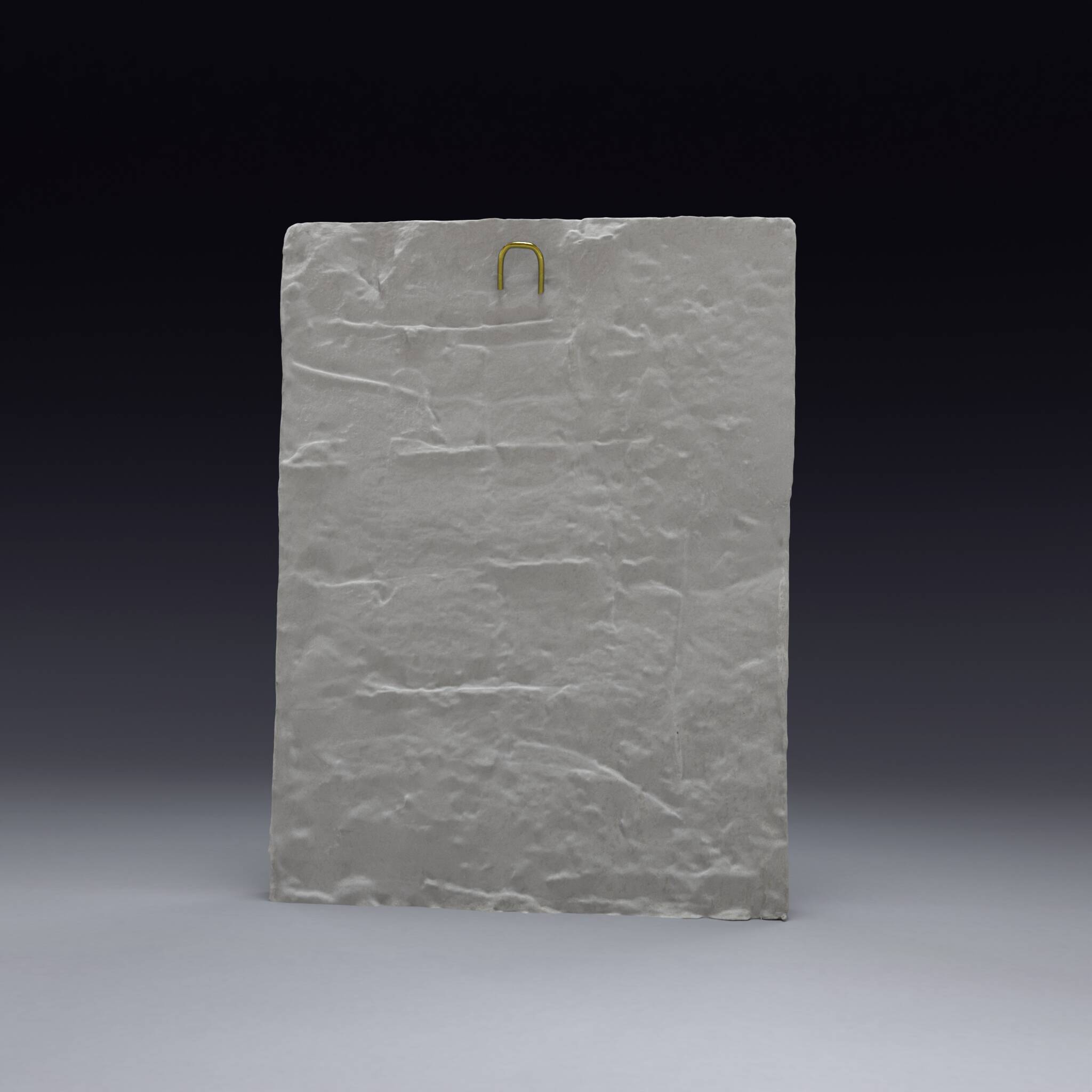 Bas-relief en plâtre d'une feuille d'acanthe avec une fleur.
