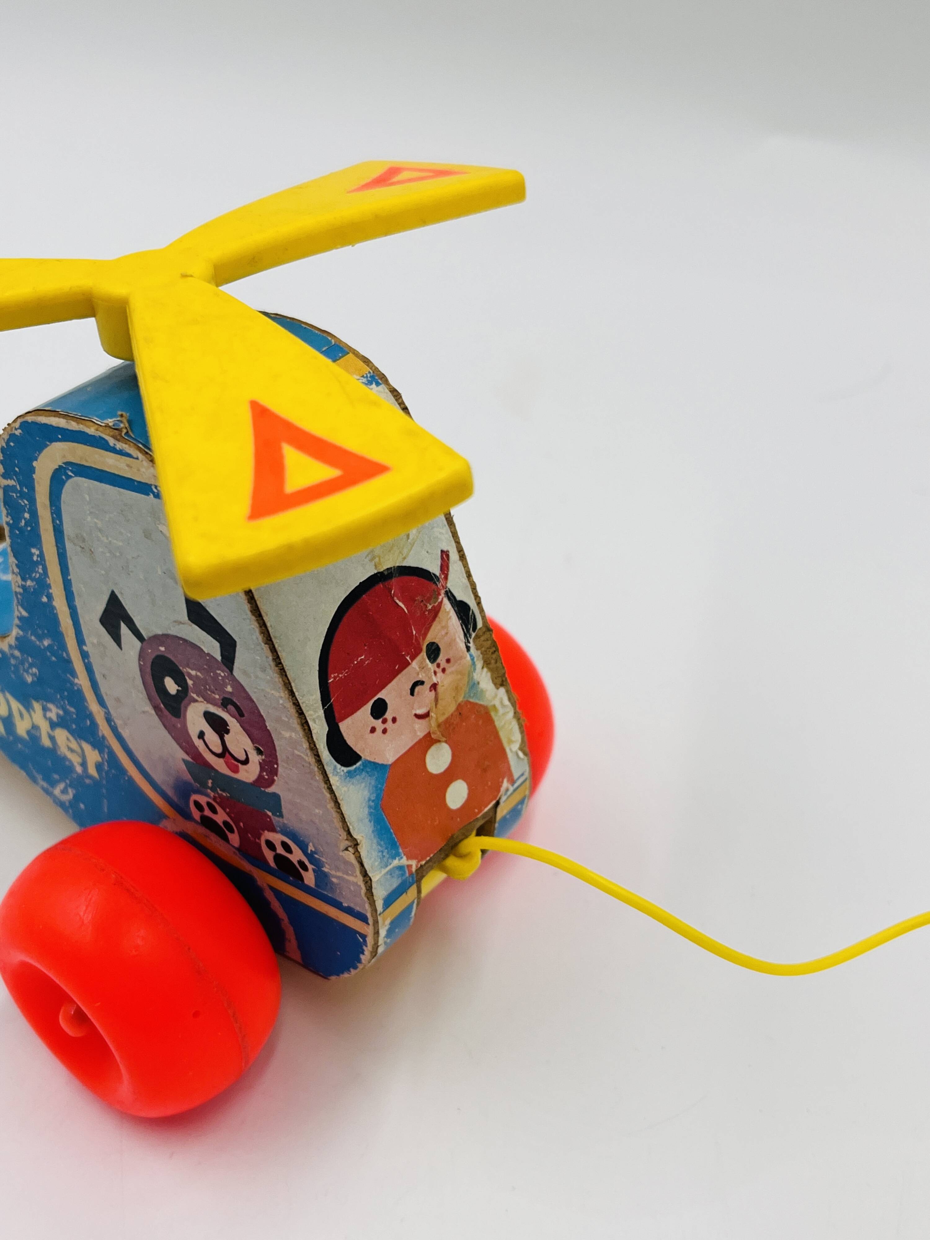 Set of 4 Fisher-Price wooden toys from the 1960s
