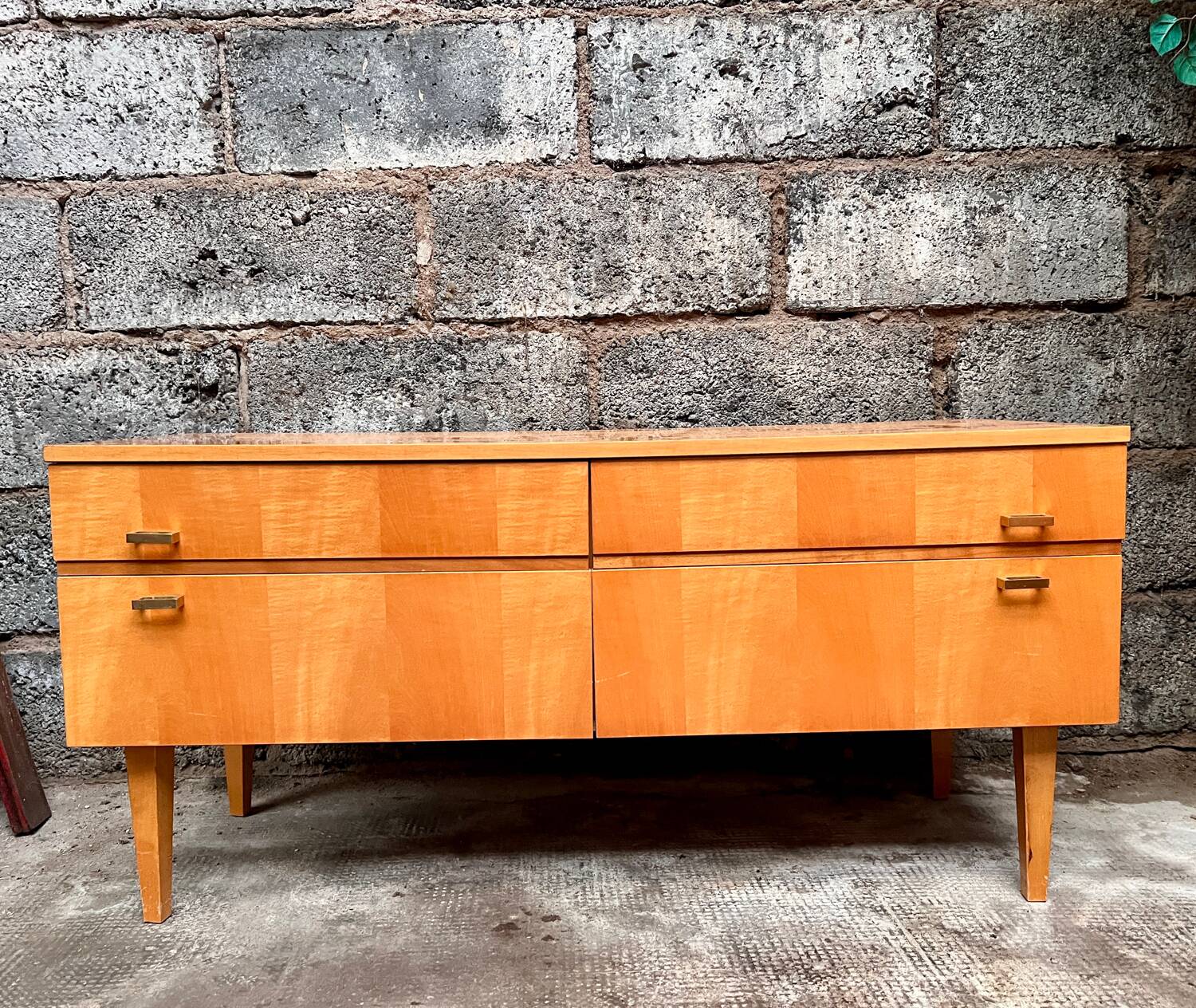 Light wood row TV unit