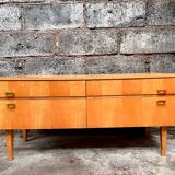 Light wood row TV unit