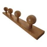 Wooden wall coat rack