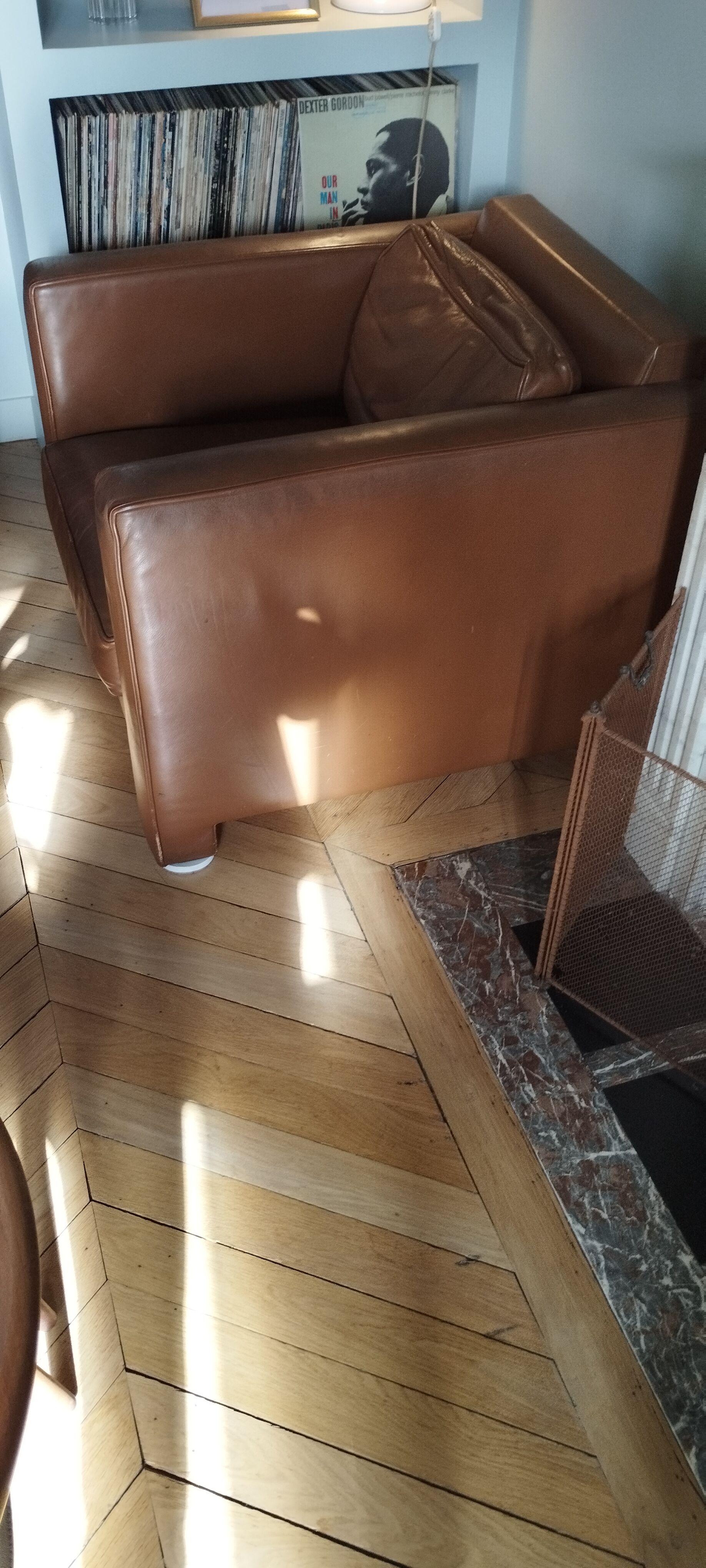 Hugues Chevalier leather armchairs