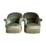 sage green toad armchairs with gold fringe