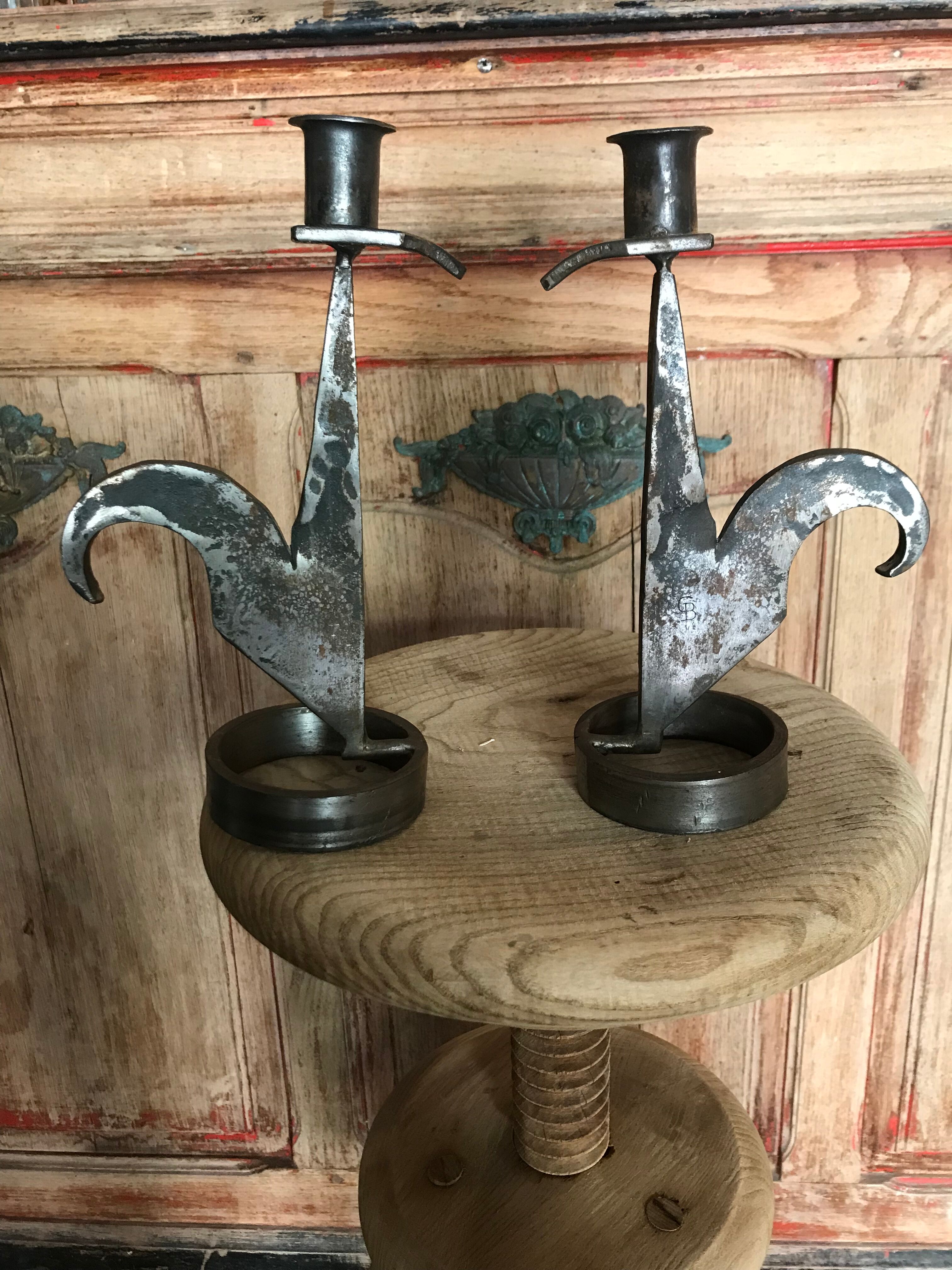 Signed zoomorphic iron candle holders