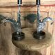 Signed zoomorphic iron candle holders