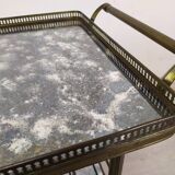 Brass and glass rolling trolley