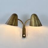 Double orientable vintage patinated brass wall light, Jacques Biny France 1950.