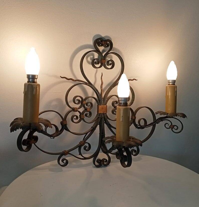 Antique wrought iron wall light from the 50s