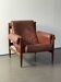 Admiral armchair by Eric Merthen, in leather and rosewood