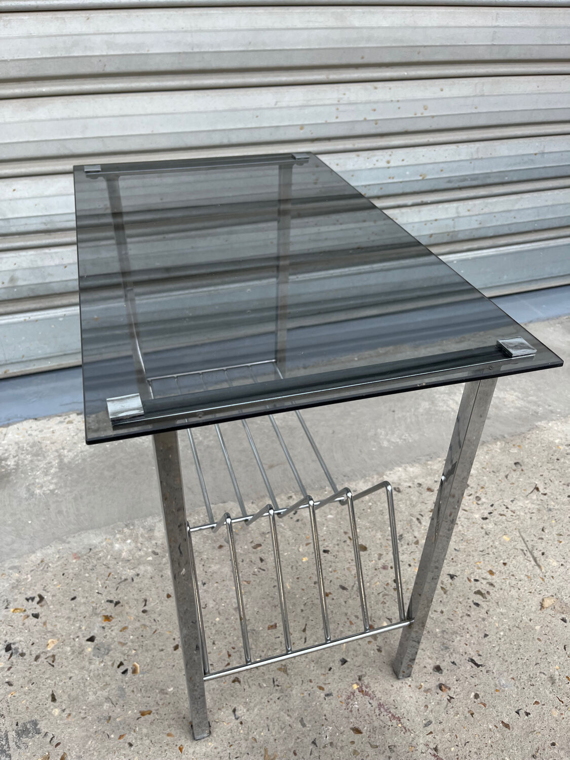 Coffee table, vinyl storage or metal and smoked glass occasional furniture