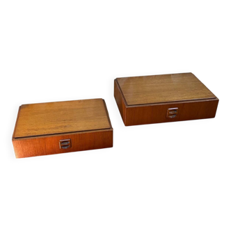 Suspended teak bedside tables in vintage 1960s Scandinavian style.