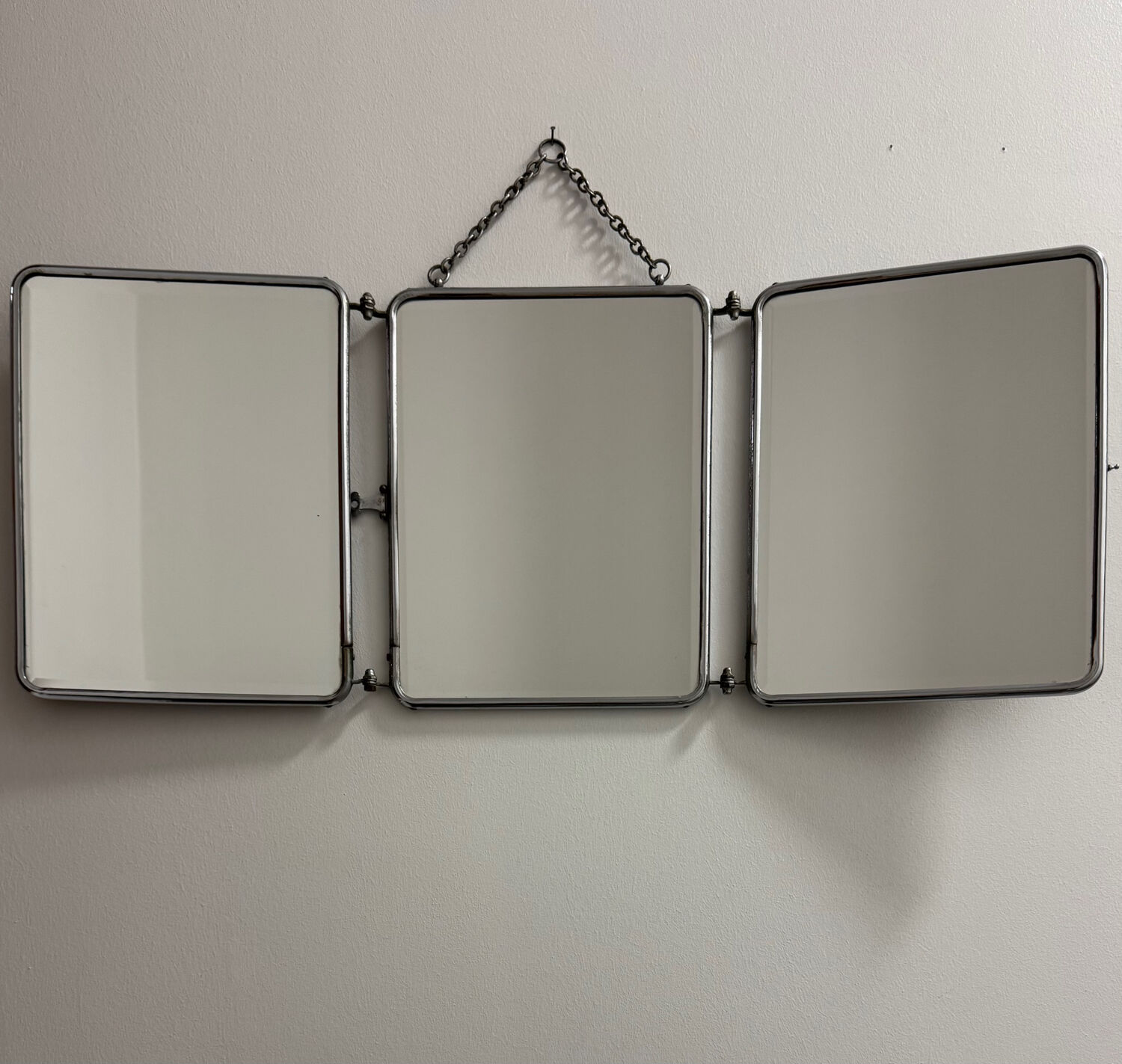 Bevelled triptych barber mirror from the 1950s.