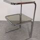 Chrome and smoked glass side table or end table, France circa 1970.