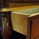 Armoire a glace de style Louis XV, en noyer sculpté
