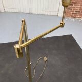 Articulated arm floor lamp