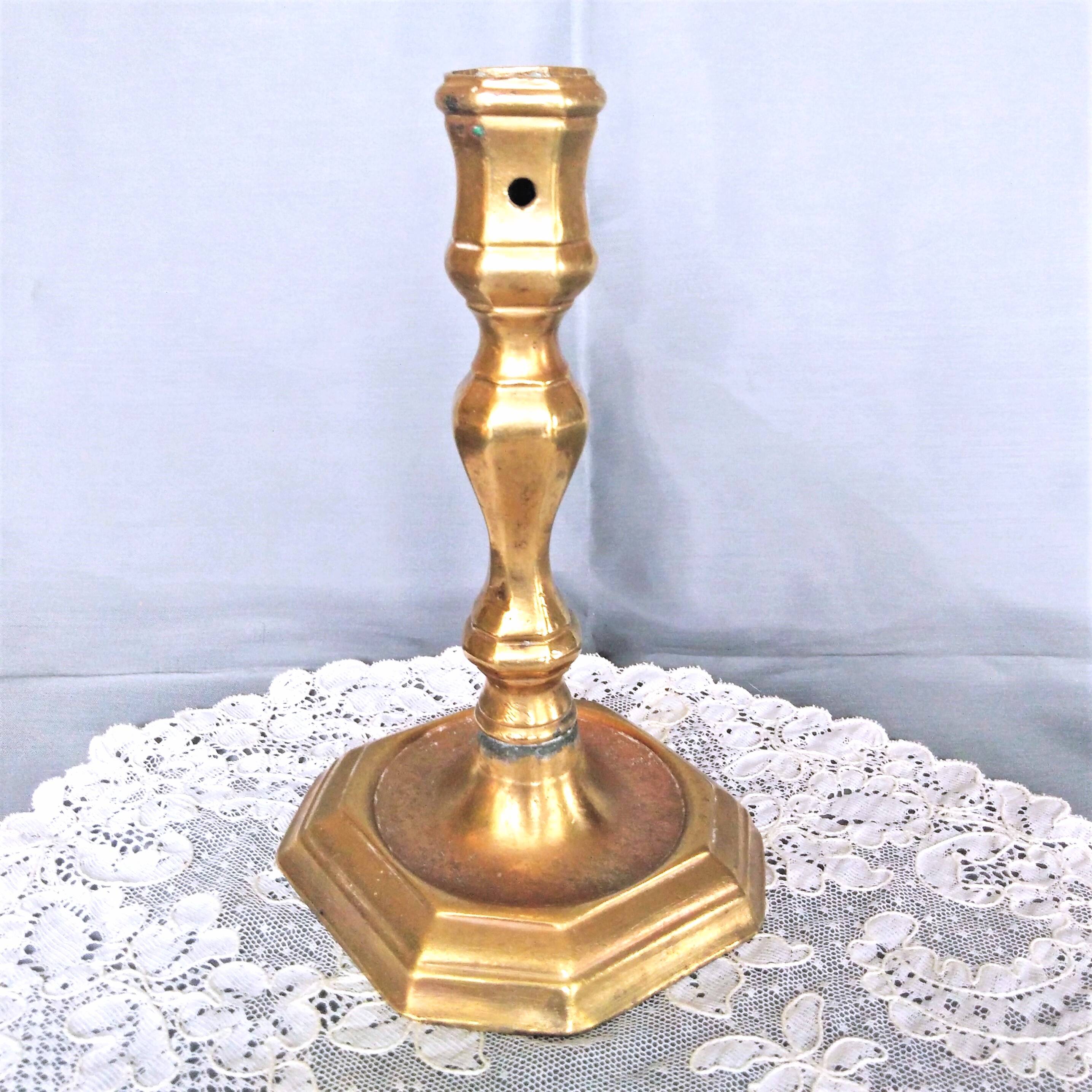 Gilt bronze candlestick with pierced bin 17th century