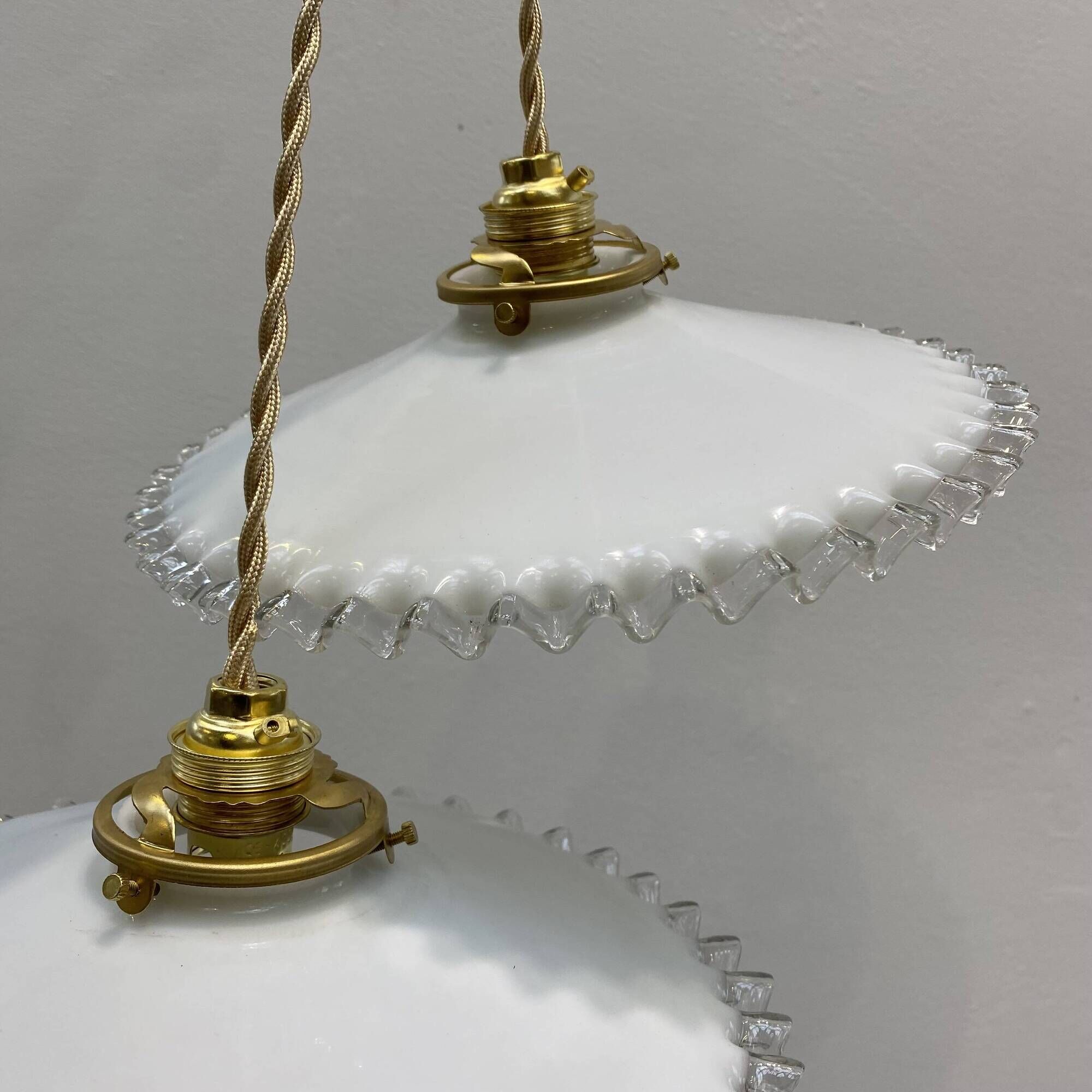 Pair of vintage pendant lights in white opaline and transparent serrated edges
