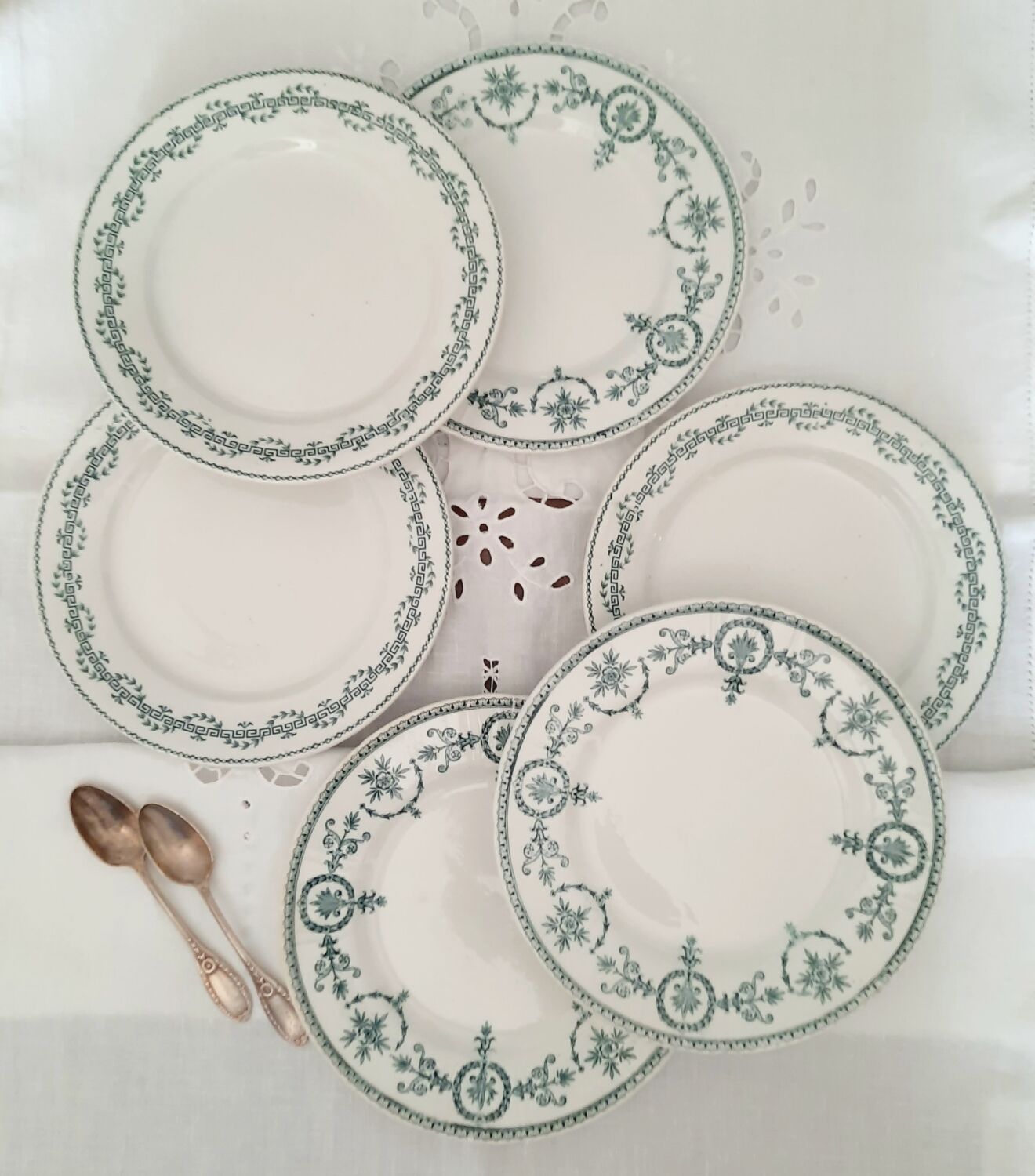 Old dessert plates mismatched in iron earth