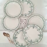 Old dessert plates mismatched in iron earth