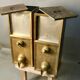 Pair of old coffee silos, coffee bean dispenser