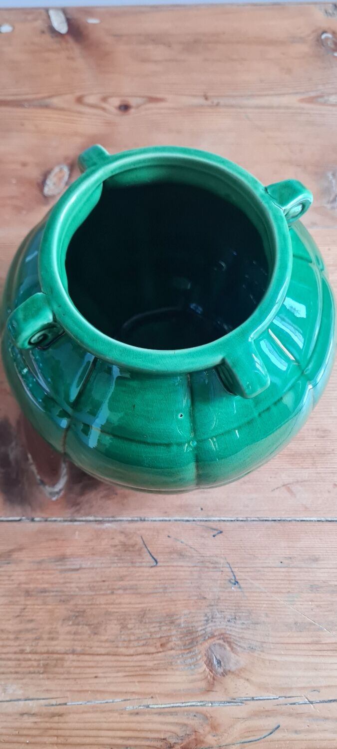 Green glazed earthenware vase