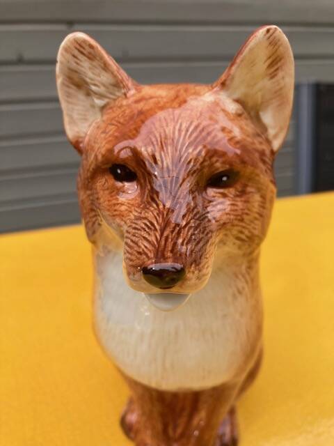 Ceramic jug in the shape of a fox.
