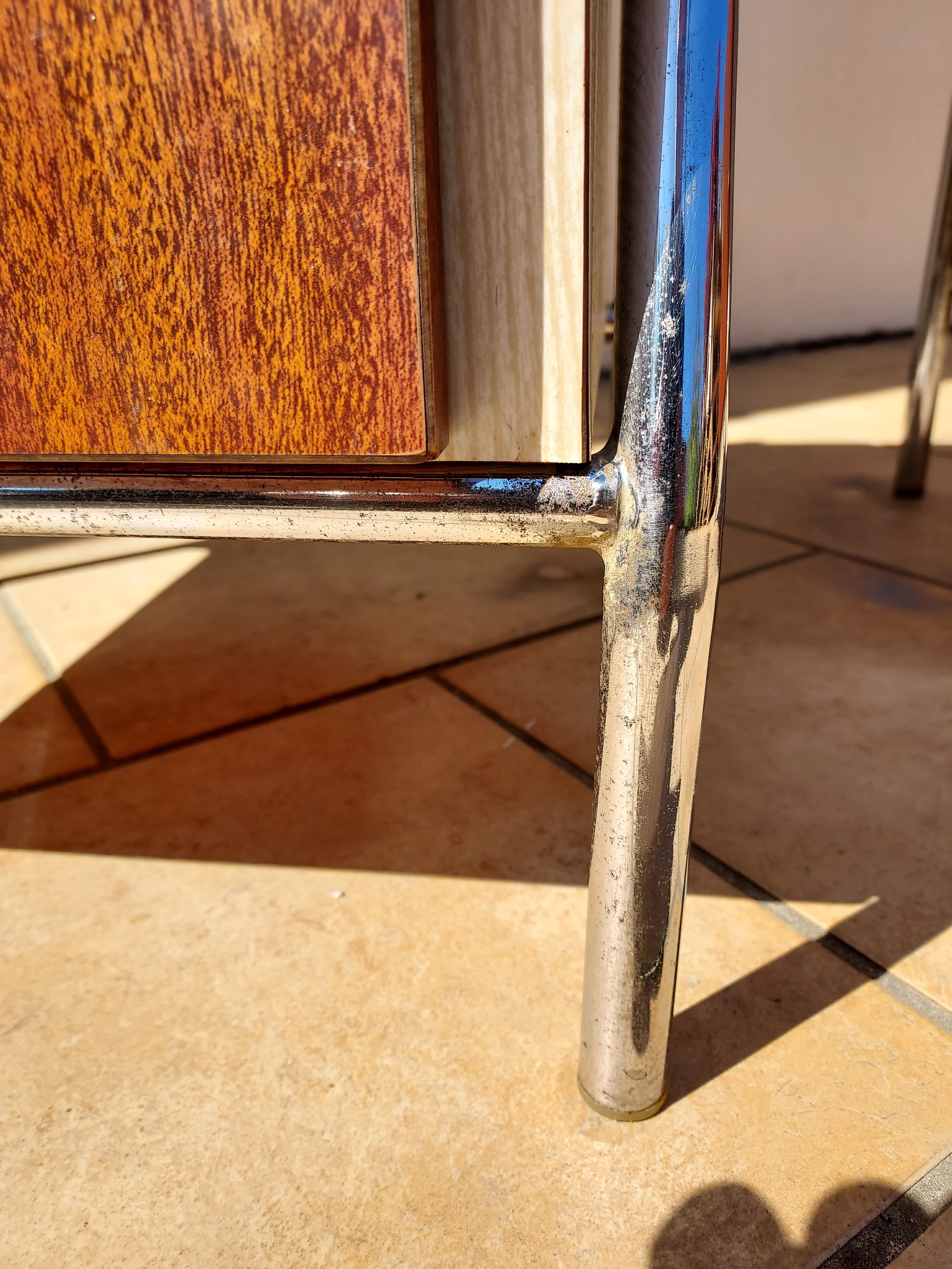 Pair of chrome boarding bedsides