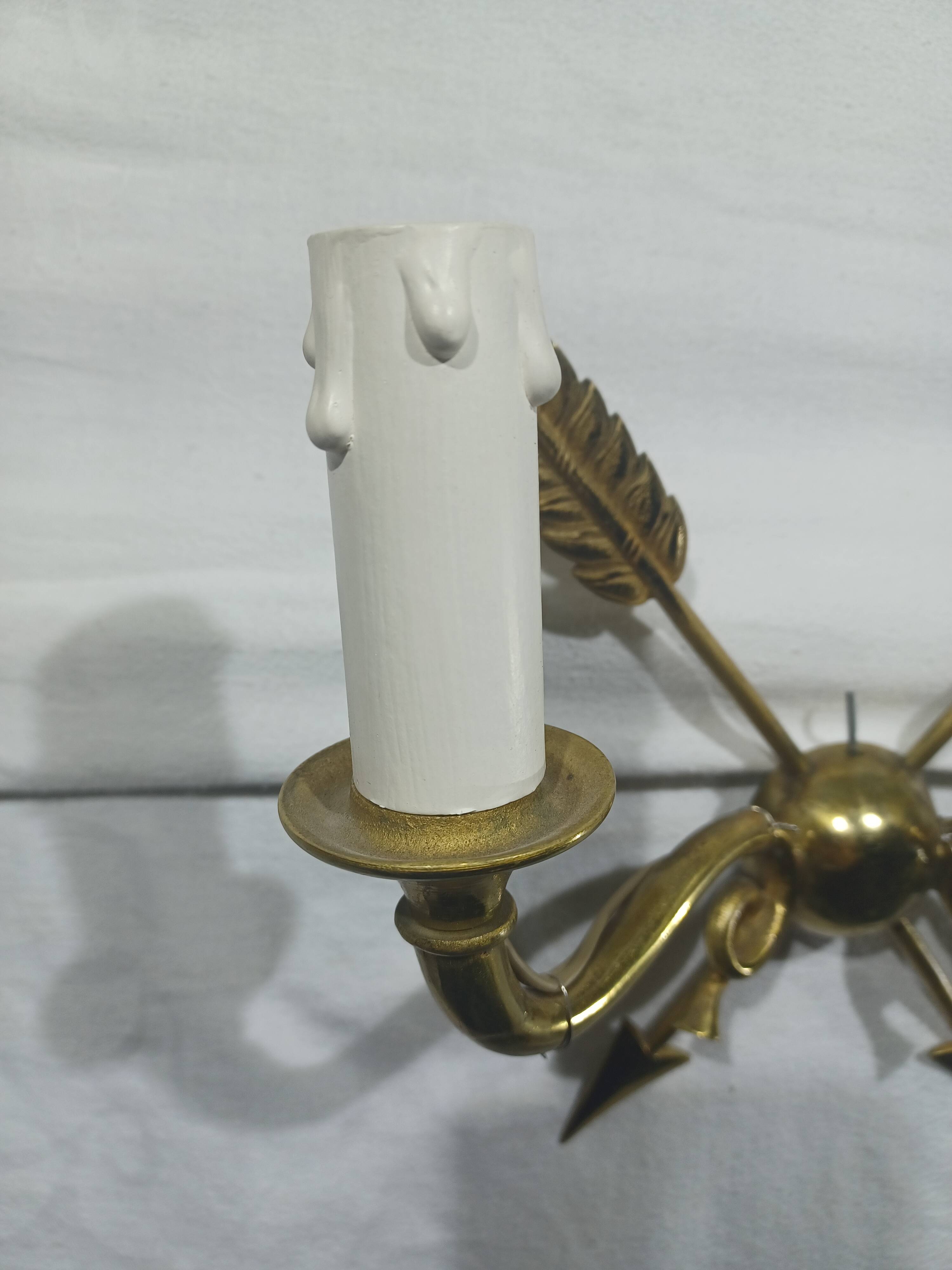 Empire style arrow wall light