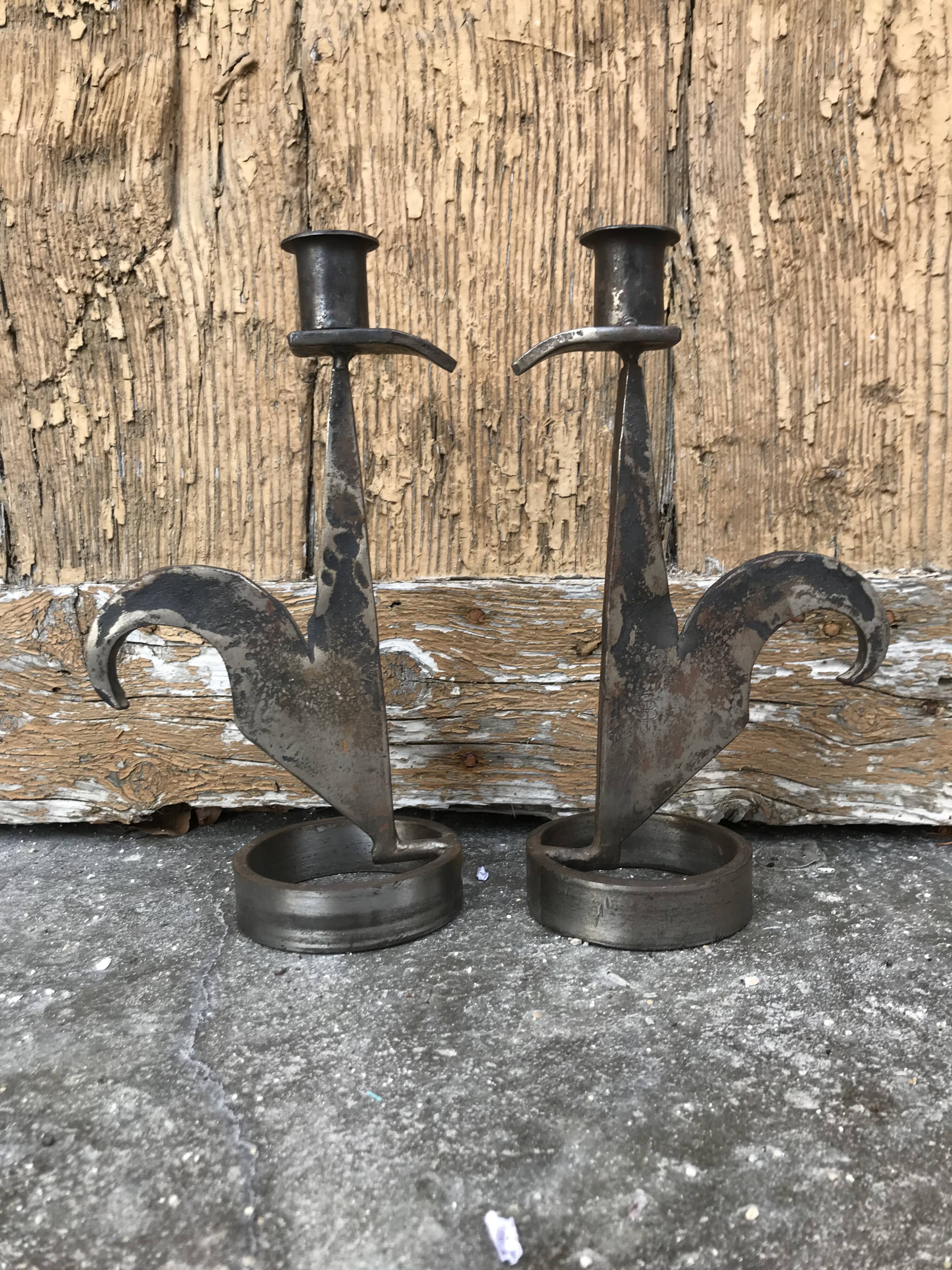 Signed zoomorphic iron candle holders