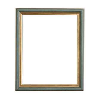 Frame in gilded and green wood