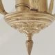 Lustre métal doré
