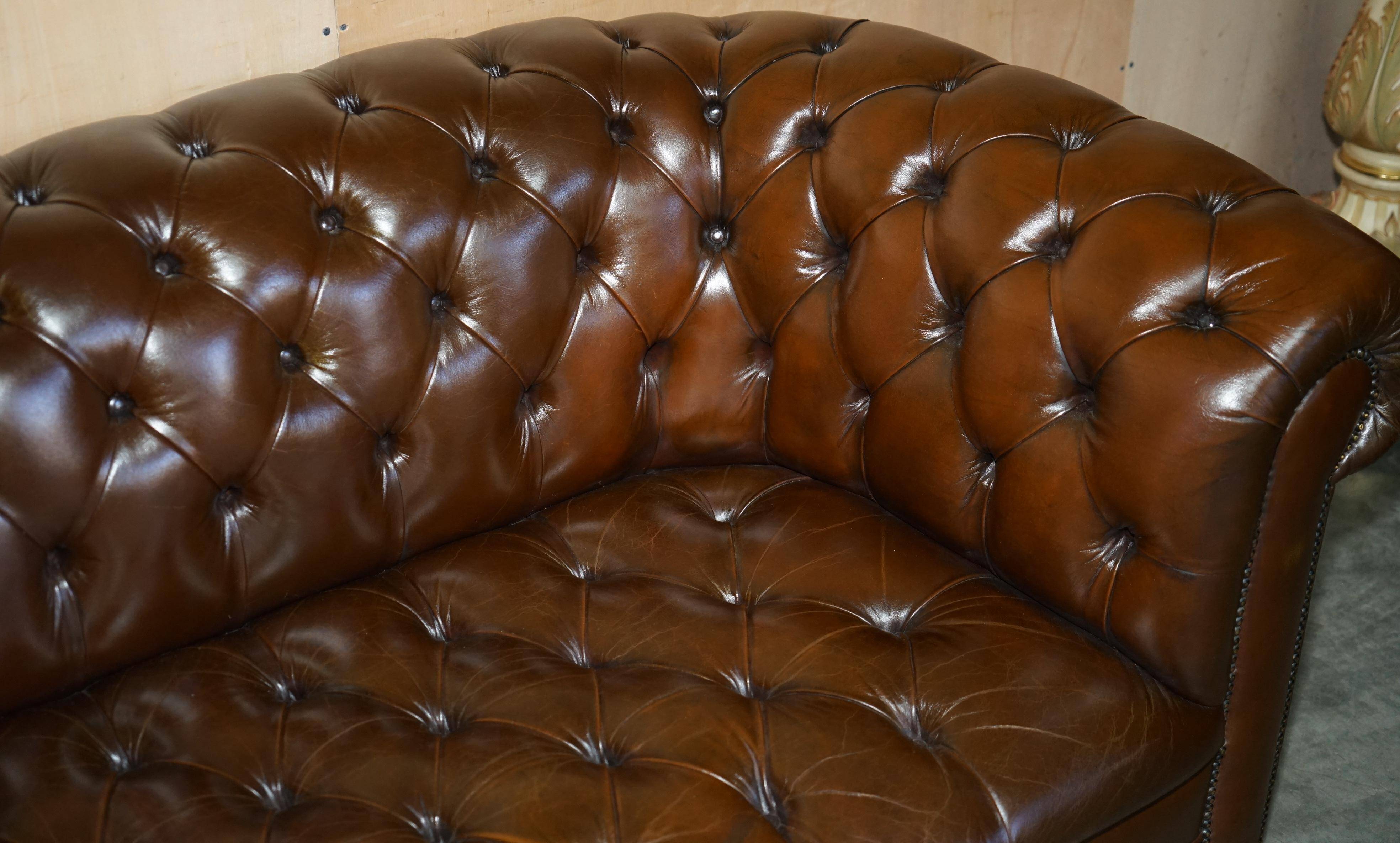 Restored Chesterfield leather sofa in vintage Art Deco style