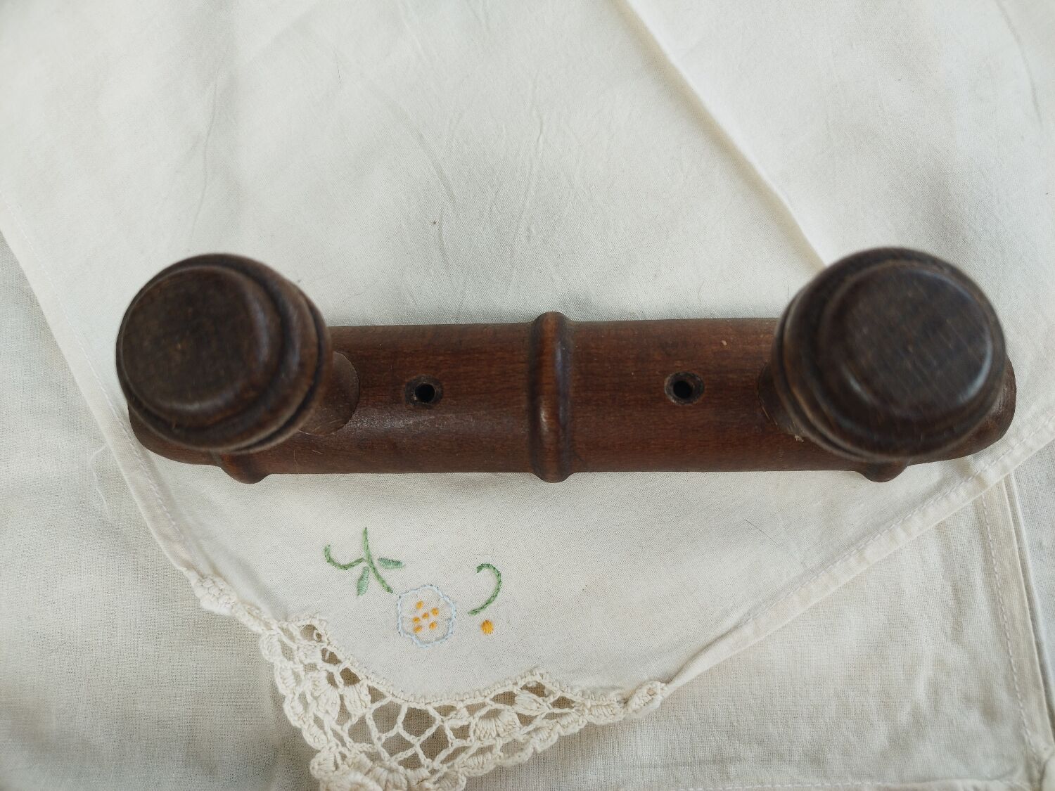 Wooden coat rack turned two hooks