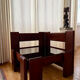 Modernist coffee table in wood and smoked glass.