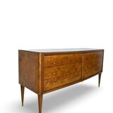 Veneered burl walnut chest of drawers with light warm brown glass top