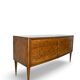 Veneered burl walnut chest of drawers with light warm brown glass top