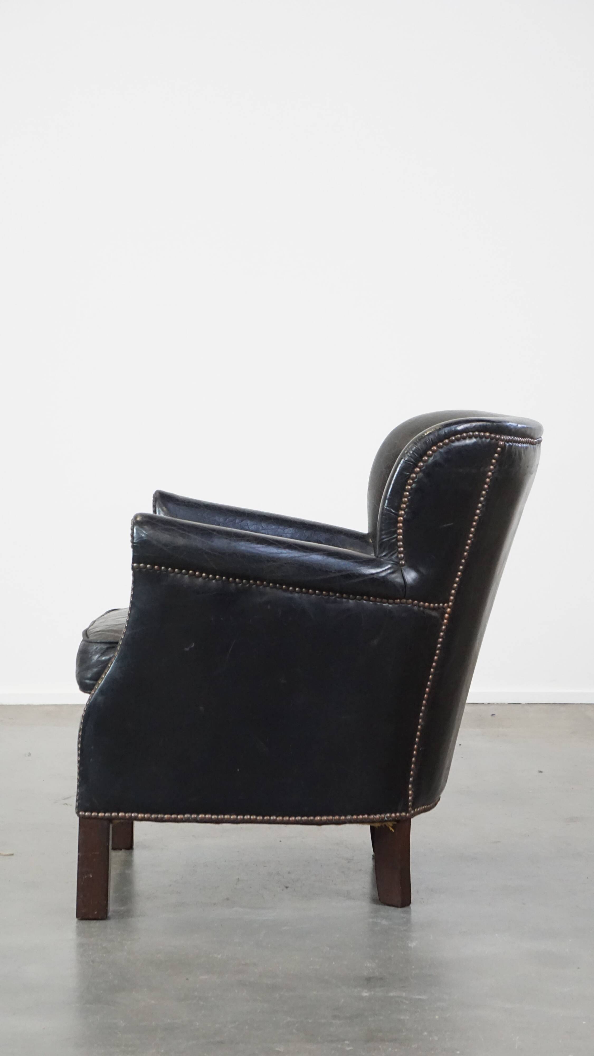 Fauteuil en cuir noir