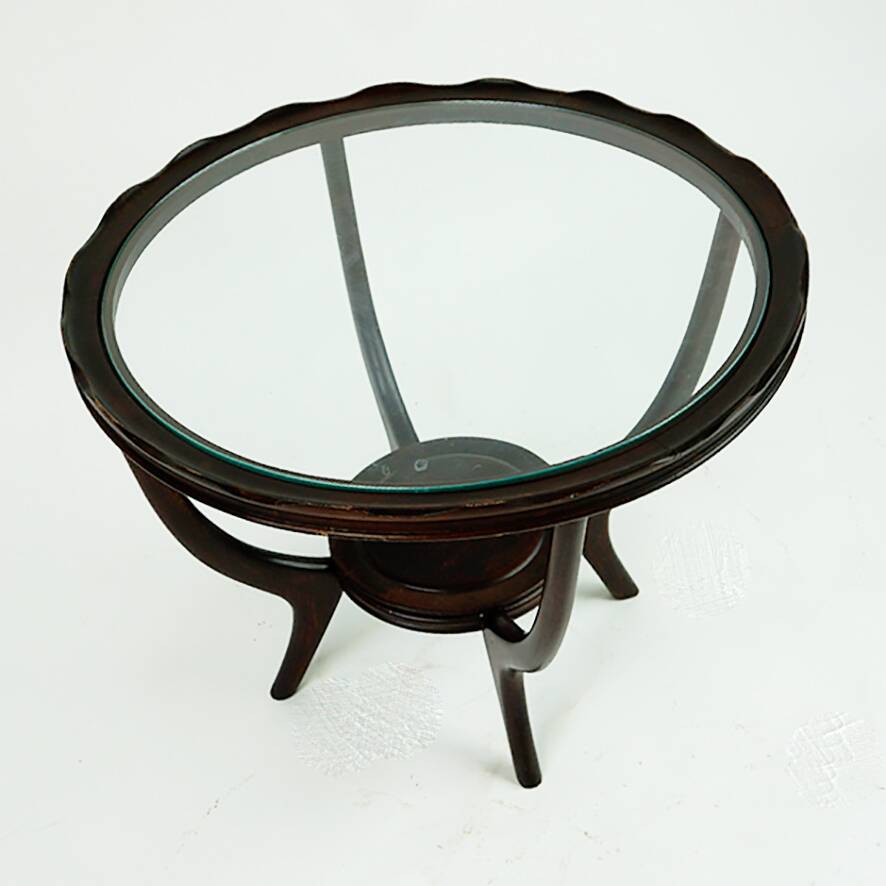 Italian round coffee table from the 1950s with a glass top, attributed to Carlo di Carli.