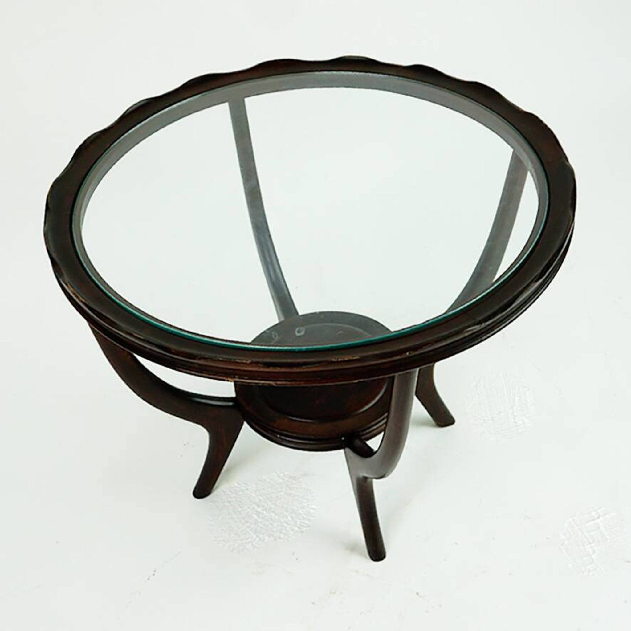 Italian round coffee table from the 1950s with a glass top, attributed to Carlo di Carli.