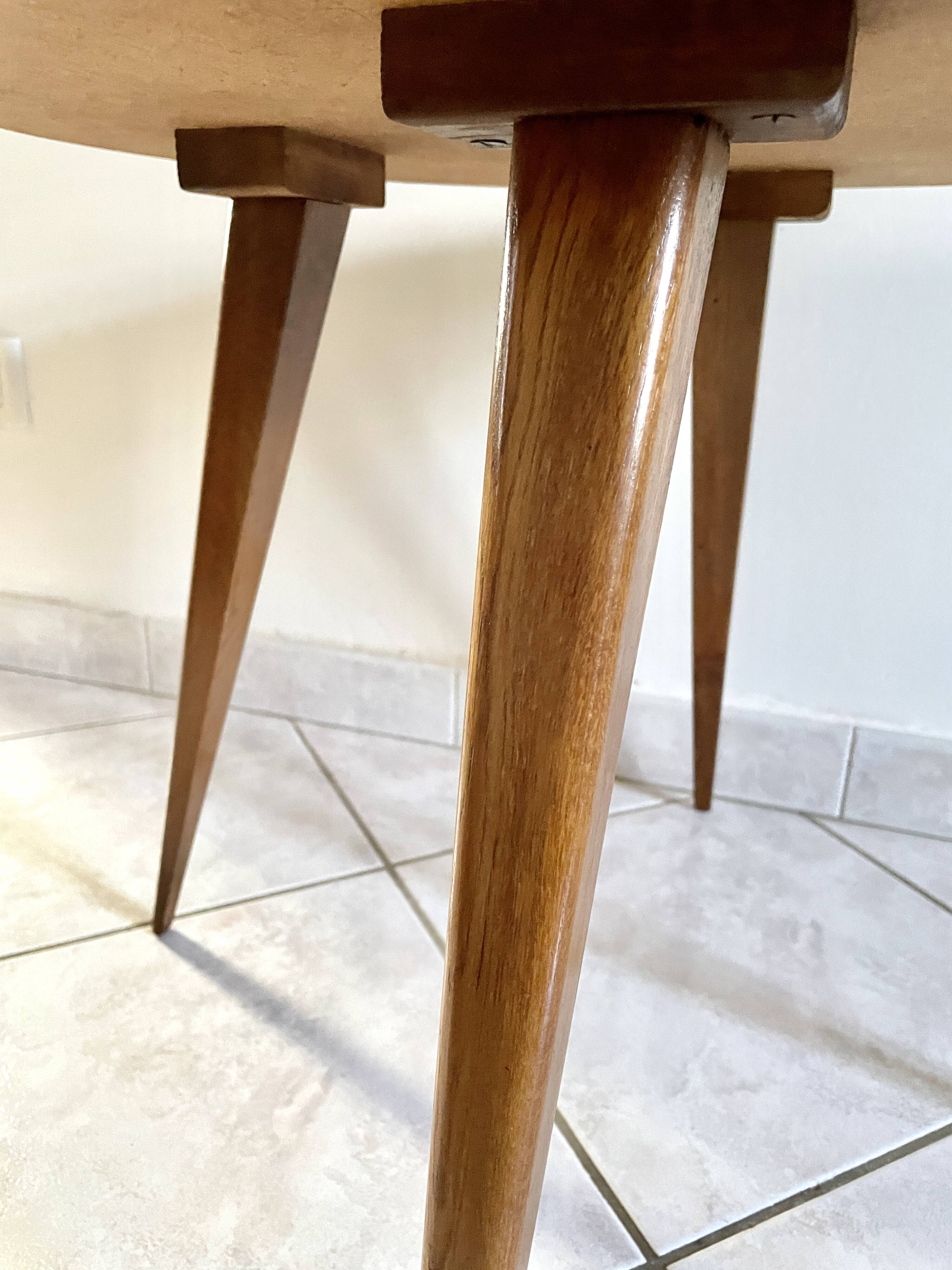 Round coffee table with compass legs 1970